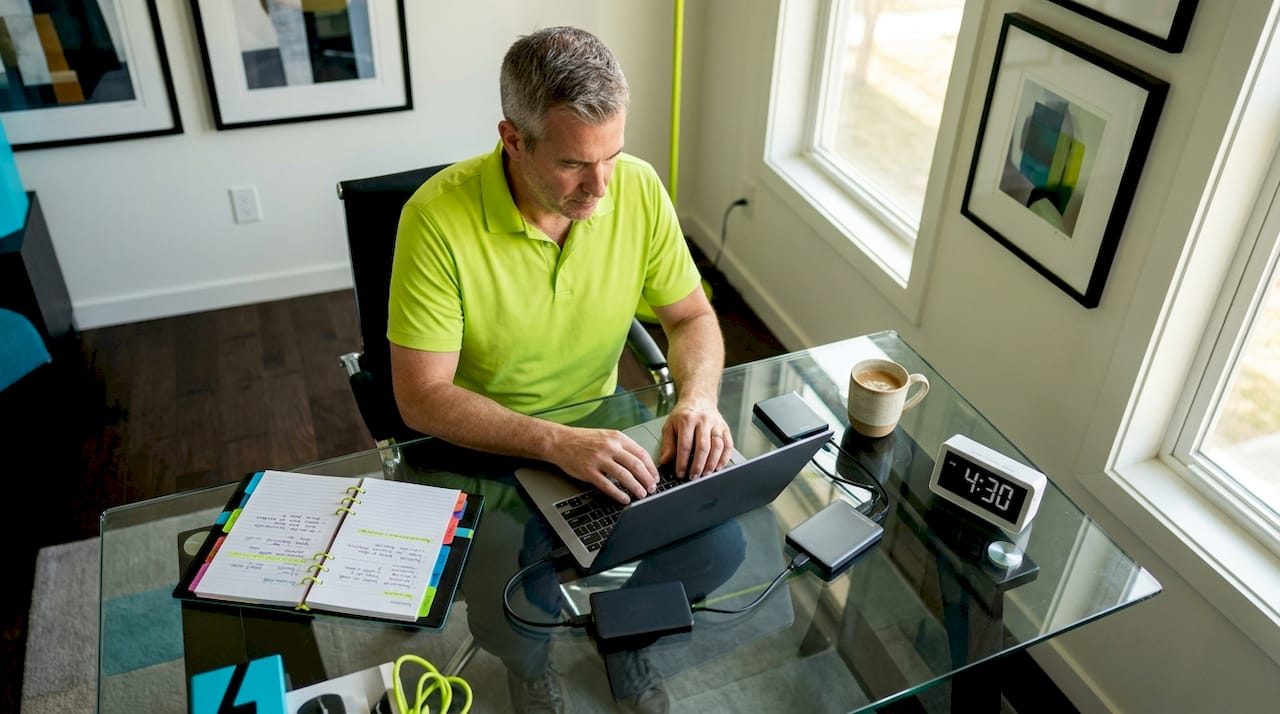 Person transferring video files with backup drives